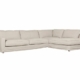 Canapé sectionnel en L beige avec coussins sur fond blanc, offrant une touche d'élégance parisienne. Canape Paris by Atelier Bis
