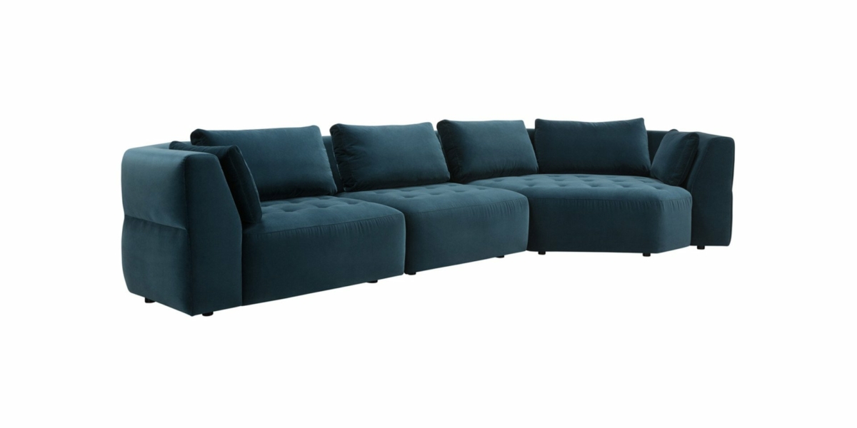 Découvrez le canapé sectionnel modulaire bleu sarcelle foncé avec coussins touffetés et un design moderne, présenté dans notre salle d'exposition, où la qualité rencontre le style sur un fond blanc immaculé. Canape Paris by Atelier Bis