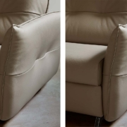 Gros plan sur l'angle et l'accoudoir d'un canapé en cuir beige, mettant en valeur les détails de couture et la texture, rappelant l'élégance parisienne. Canape Paris by Atelier Bis