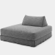 Chaise grise, moderne, sans accoudoirs, avec un coussin rectangulaire et un dossier assorti, parfaite pour un showroom parisien chic, sur fond blanc immaculé. Canape Paris by Atelier Bis