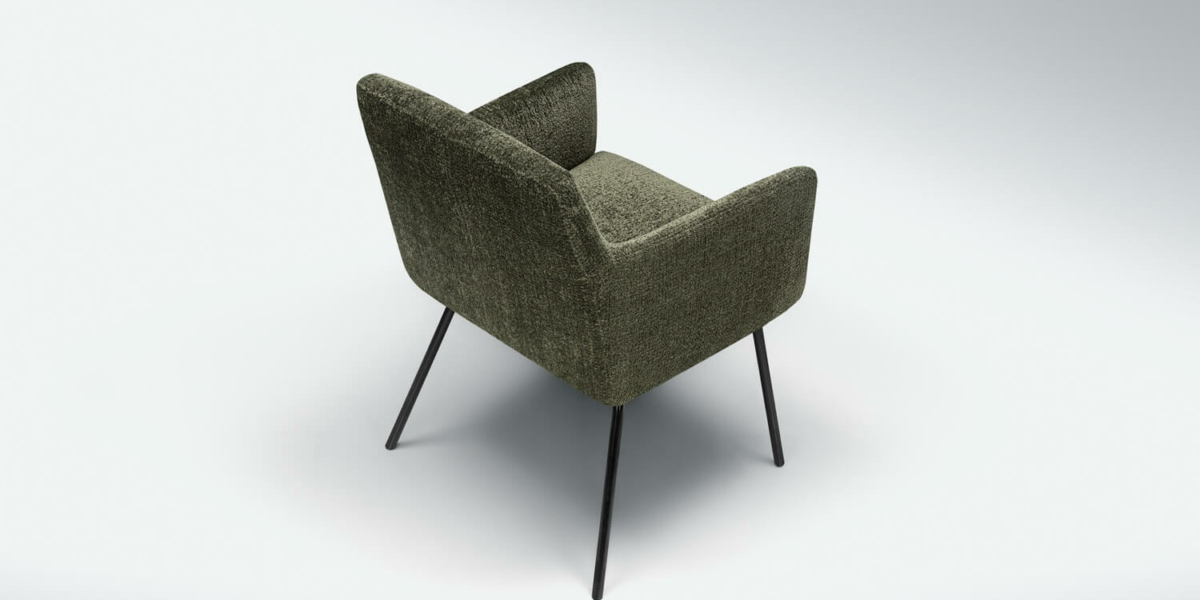Fauteuil Moa Bistro en tissu bleu clair dans une chambre minimaliste Le fauteuil en tissu bleu clair se trouve dans une chambre minimaliste avec des murs blancs et des meubles en bois clair.