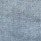 Gros plan d'un tissu gris clair texturé avec un petit motif étroitement tissé ressemblant à des cailloux. Canape Paris by Atelier Bis