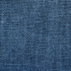 Gros plan sur un tissu bleu texturé avec un motif tissé et pointillé. Canape Paris by Atelier Bis