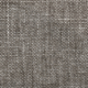 Gros plan d'une étoffe beige texturée et tissée, dont les fibres sont petites et serrées. Canape Paris by Atelier Bis