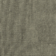 Gros plan d'un tissu gris texturé dont les fils sont visibles et la surface légèrement rugueuse. Canape Paris by Atelier Bis