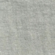 Gros plan sur un tissu gris clair dont la texture tissée est visible et dont les fils sont subtils et irréguliers. Canape Paris by Atelier Bis