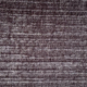 Gros plan sur une moquette texturée, gris foncé, avec de subtils motifs de lignes horizontales et verticales. Canape Paris by Atelier Bis