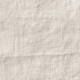 Tissu de lin beige texturé avec des plis visibles et un subtil motif de tissage en forme de grille. Canape Paris by Atelier Bis